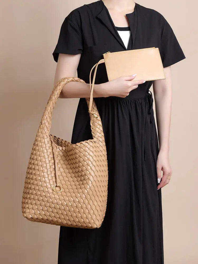 Beige woven PU leather hobo bucket bag with top handle and matching zip pouch, stylish casual trunk handbag.