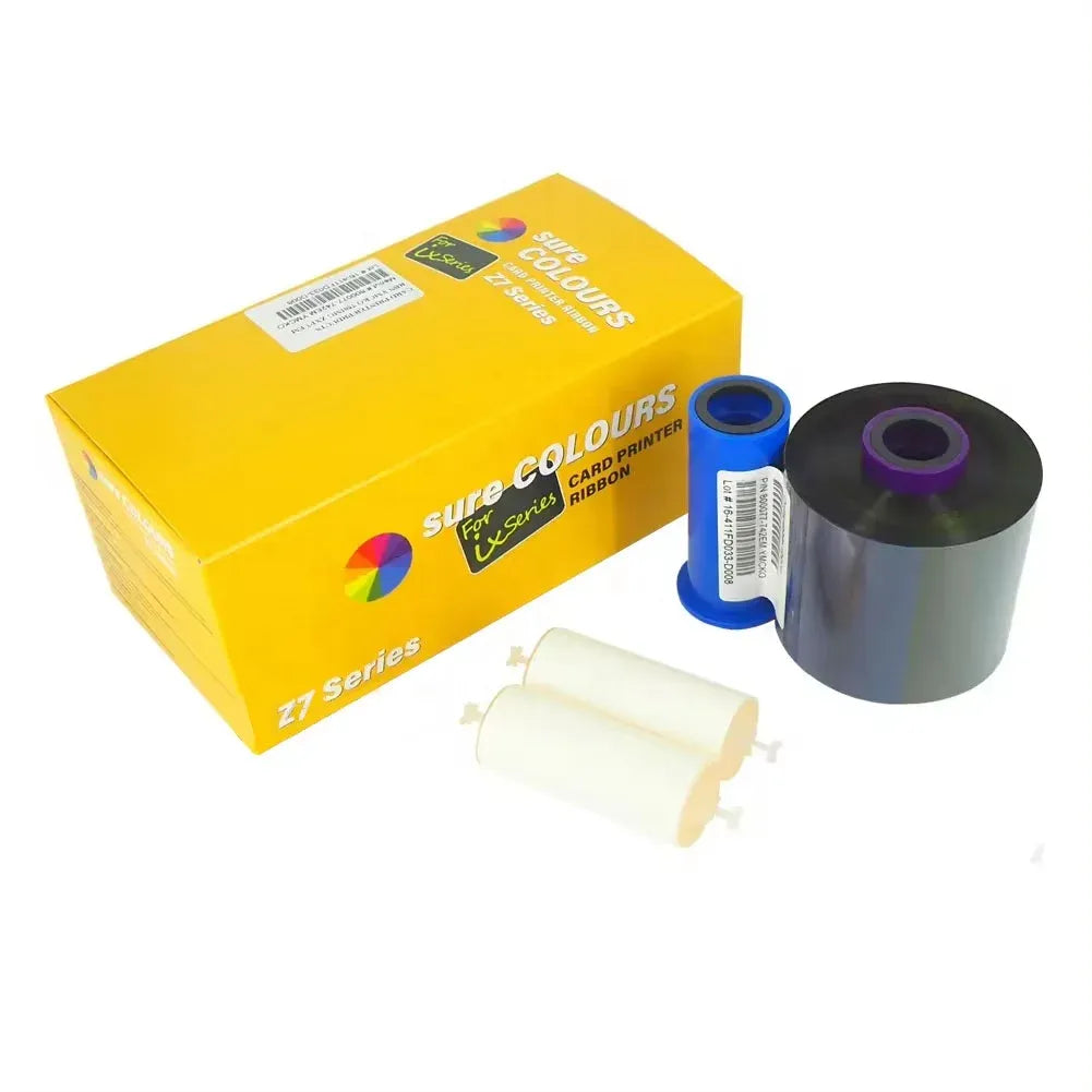 Yellow box and two color printer ribbon rolls with white cleaning kit pieces