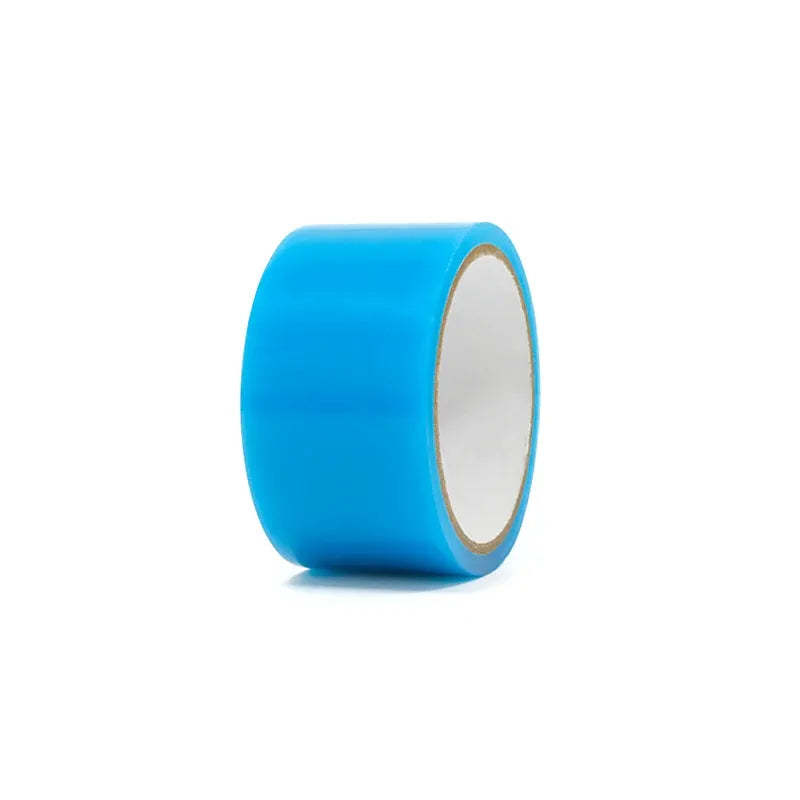 Blue self-adhesive repair tape roll, angled view with inner core visible