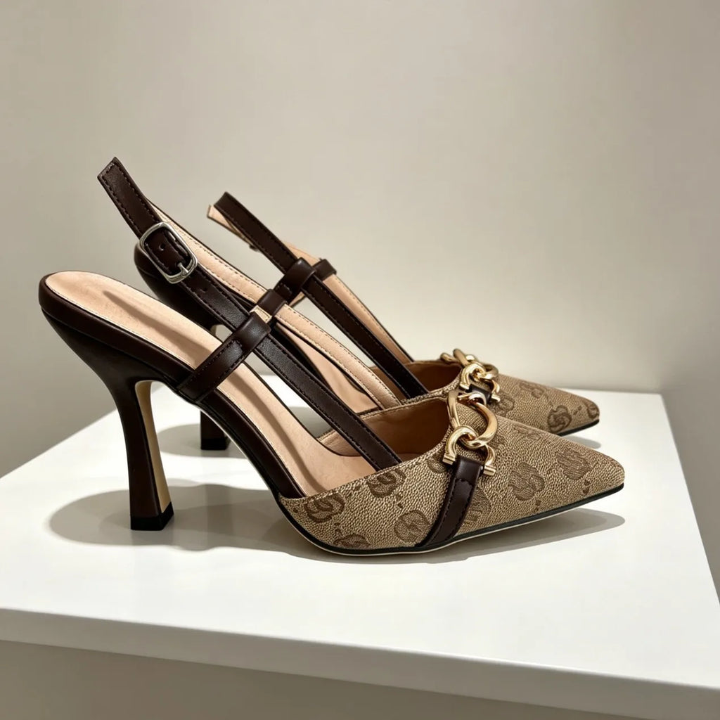 This Fashionable Sandal Features a  Rhinestone Bow Design. It Has a Unique, Slender Heel Style and Is Versatile