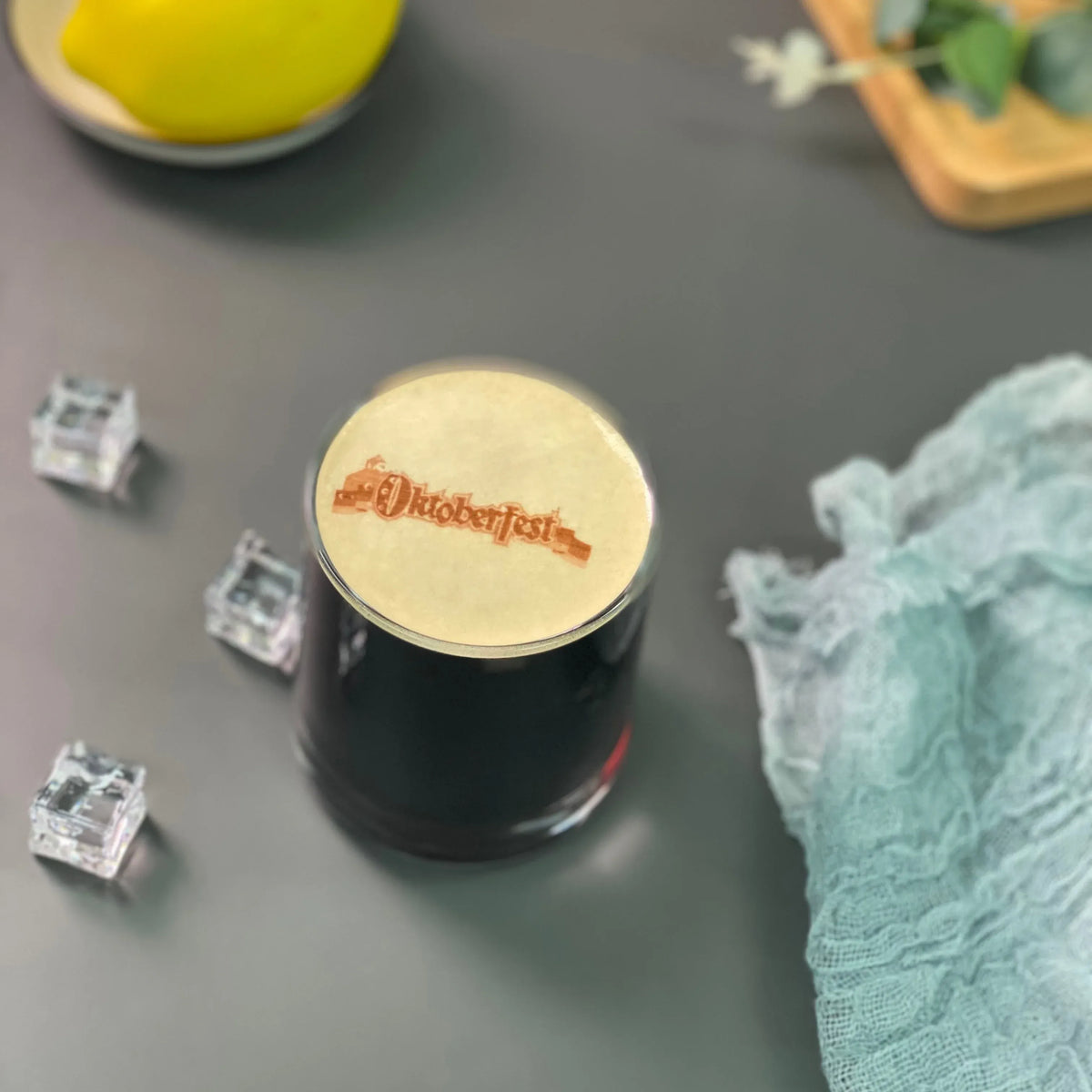 Black edible ink cartridge with round top label and small ink cartridge pieces