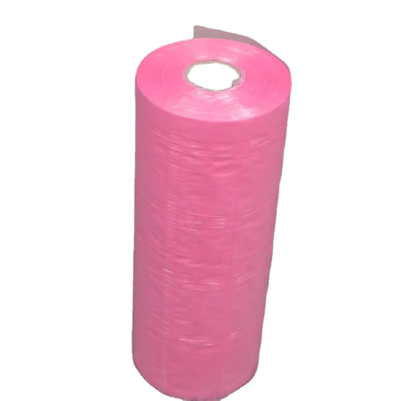 Pink bubble wrap roll with center hole on cardboard-free core, ready for shipping