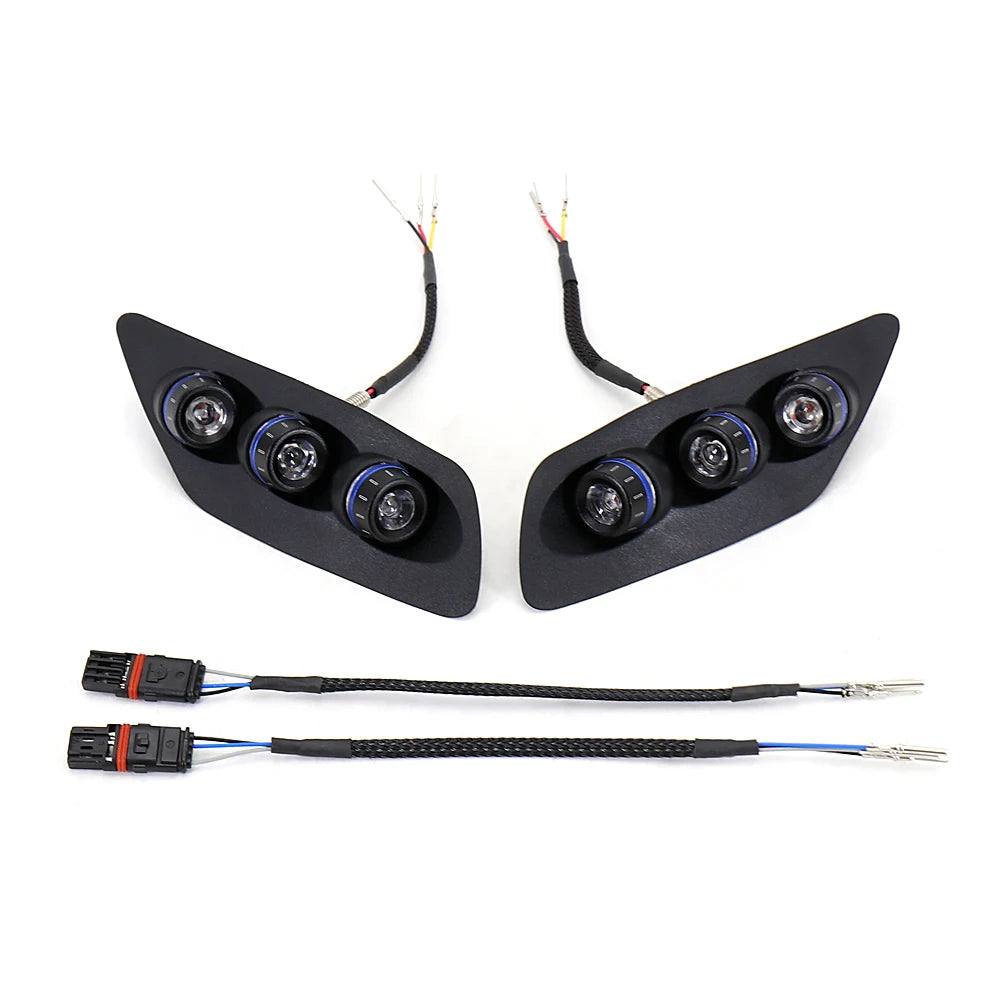 Pair of black motorcycle LED tail and turn signal lights with blue-ring lenses and wires
