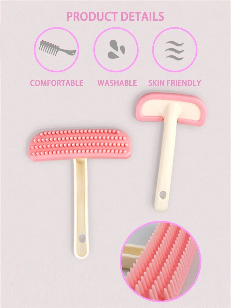Pink silicone small pet comb for rabbits and cats. Washable, skin-friendly grooming brush for gentle hair removal.
