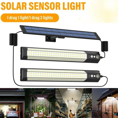 Black solar sensor light with separate solar panel and two LED strips for outdoor illumination.
