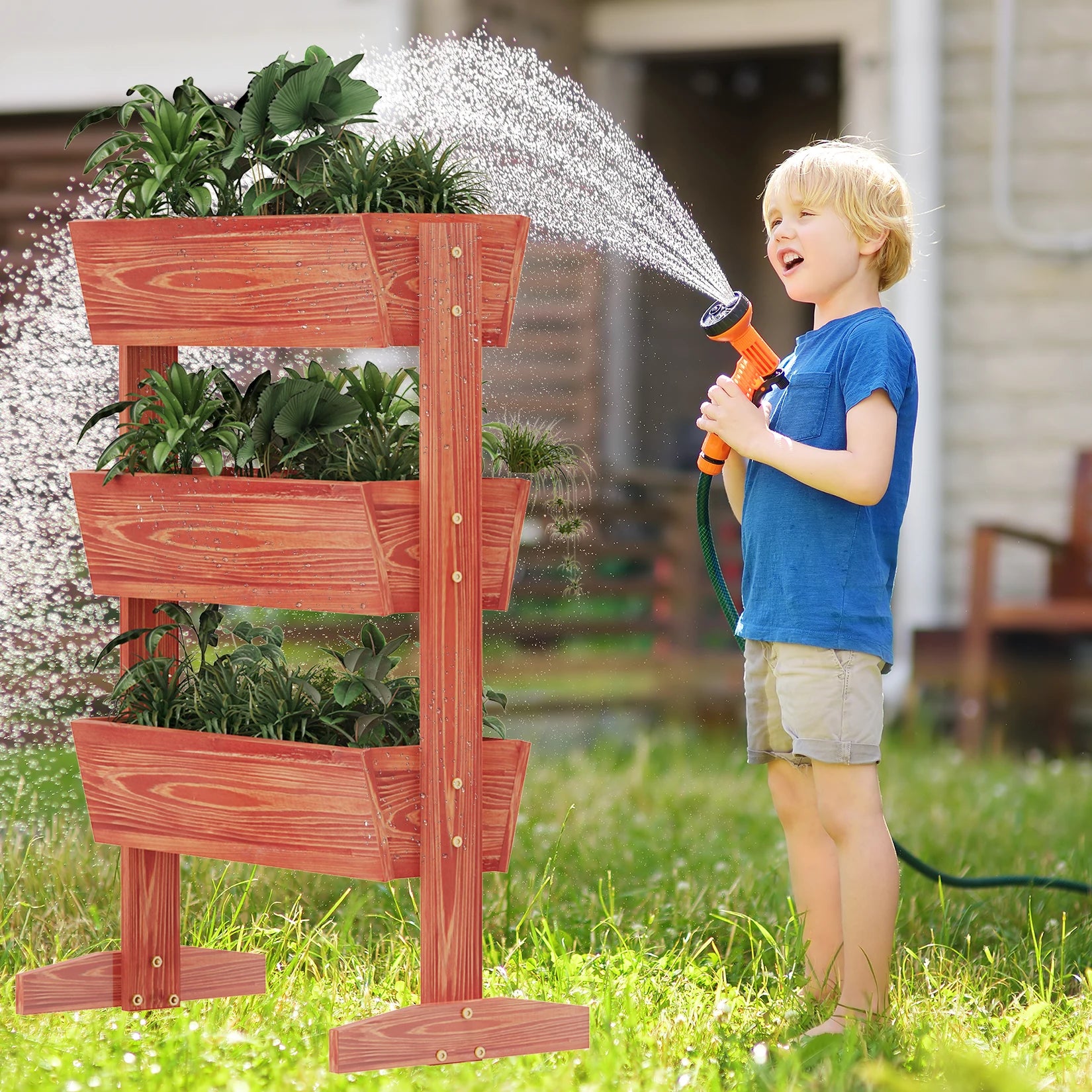 4-tier raised wooden planter box, reddish brown, with leafy plants being watered