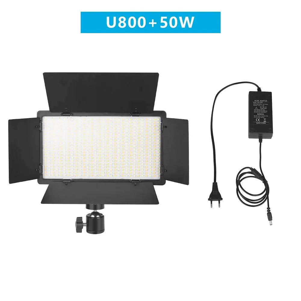 U800 LED video light panel with adjustable black barn doors, ball head mount, and a separate AC power adapter.