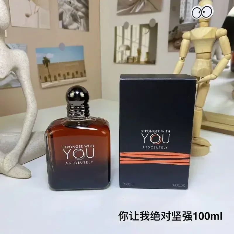 Stronger With You Absolutely 100ml unisex oud perfume. Amber glass bottle with dark cap. Long-lasting luxury scent.
