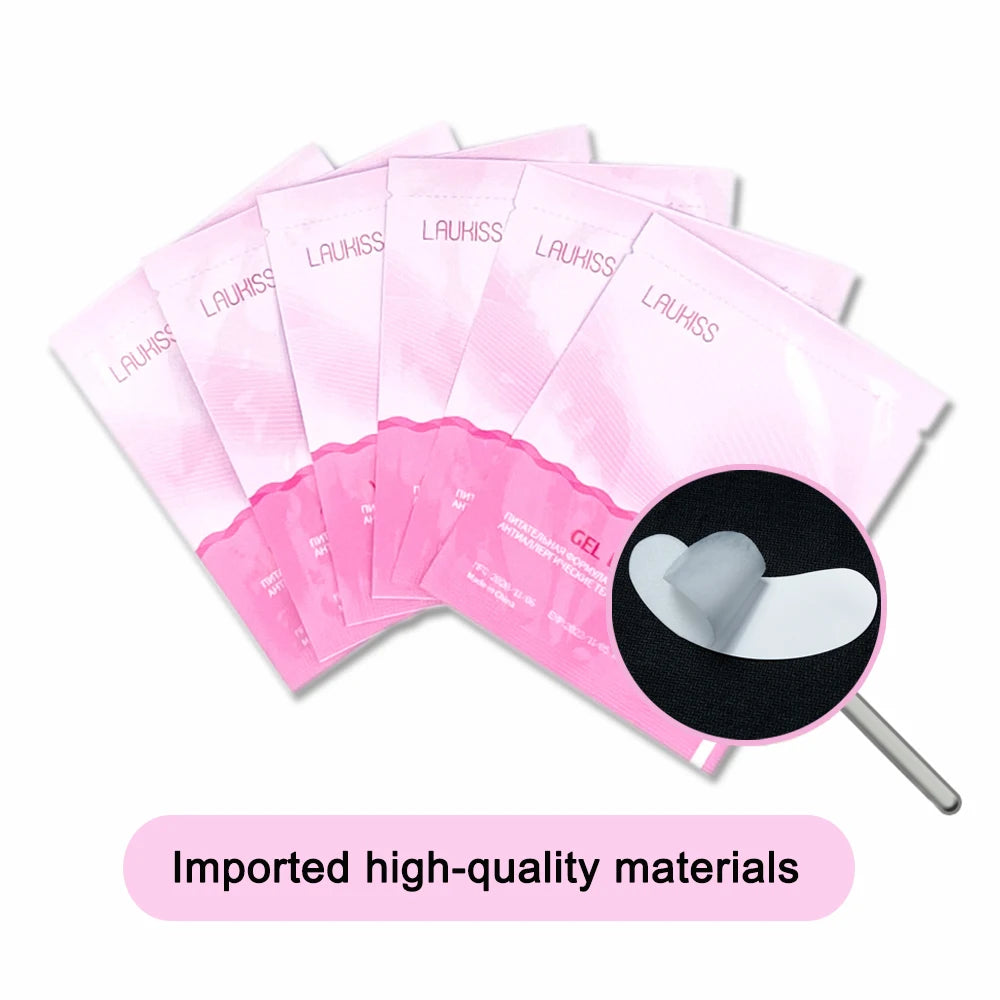 Laukiss eyelash extension gel pads in pink individual sachets, featuring white under-eye patches for lash application.