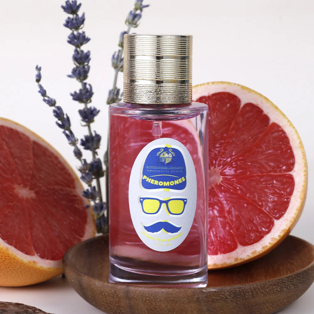 50ml luxury pheromone perfume bottle with floral lavender and fresh grapefruit, clear pink liquid in glass spray bottle.