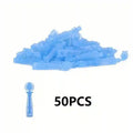 A pile of small, translucent blue plastic disposable lancets or acne tools, with one single unit shown below.