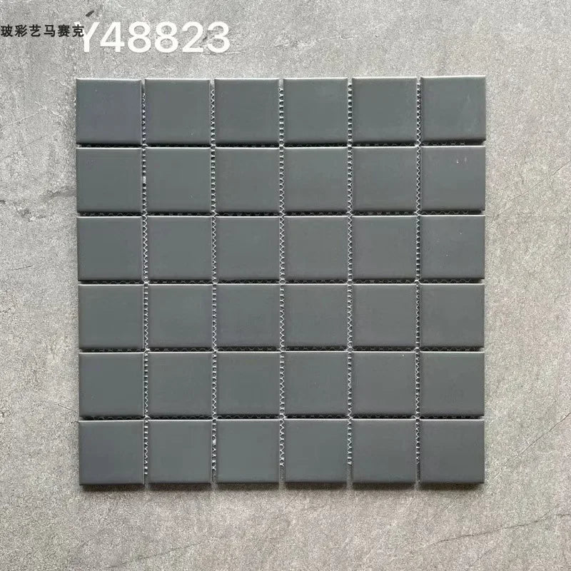 Ceramic mosaic wall tiles sheet with matte gray squares and dark grout lines