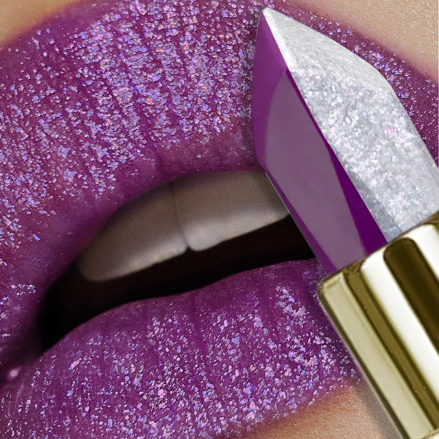 Two-tone purple lipstick with glitter and matte finish on lips next to a split-textured glittery purple lipstick tube.