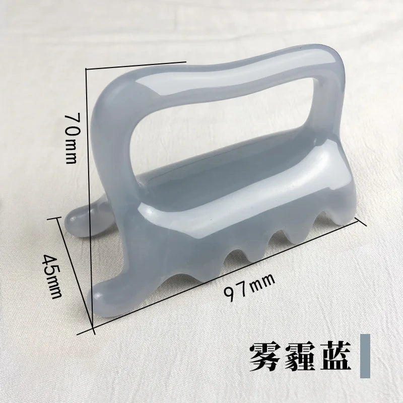 Grey, translucent resin gua sha massage tool with a handle and four-pronged comb edge. 97x70x45mm dimensions shown.