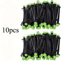Black and green drip irrigation stake emitters pack with adjustable water flow nozzles