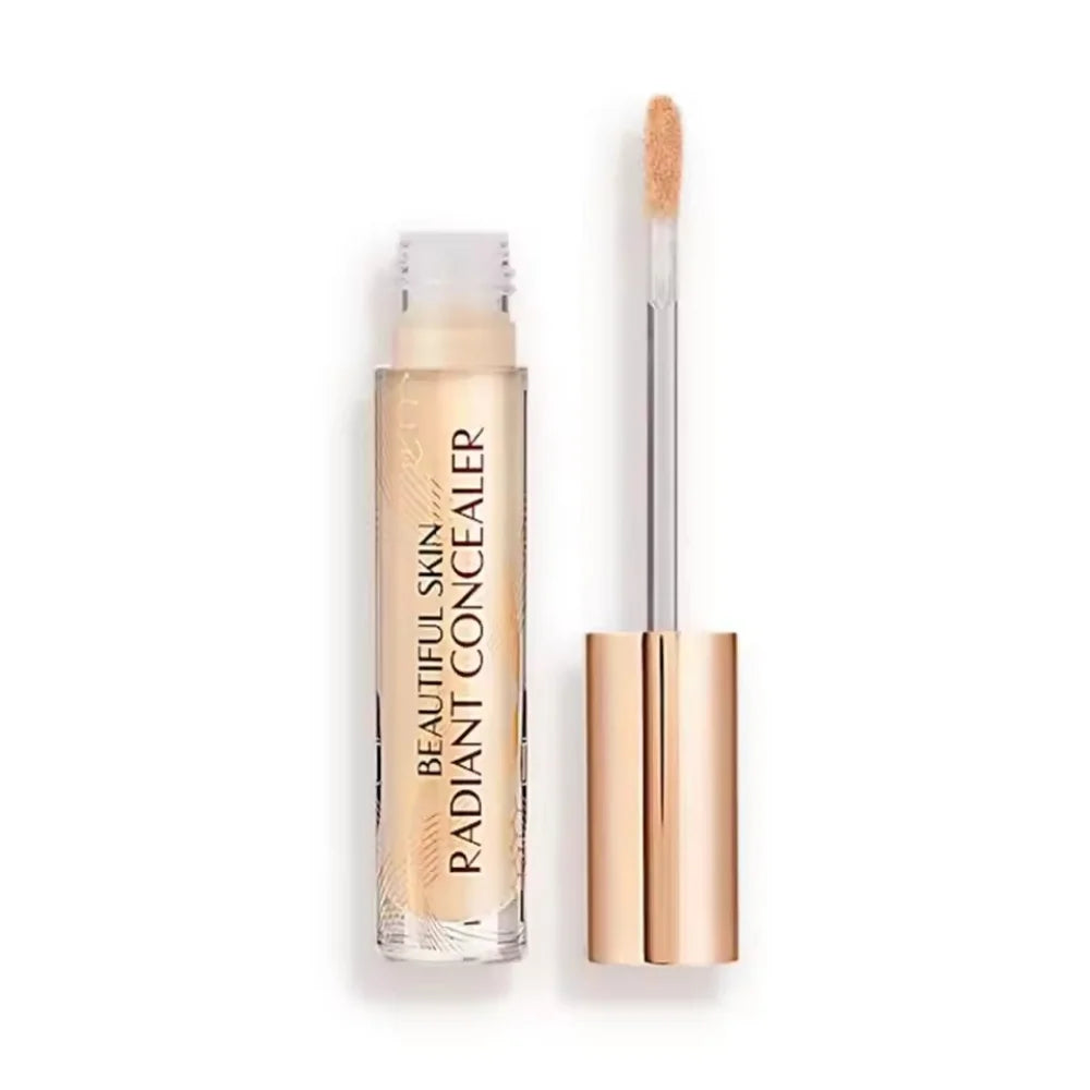 Charlotte Tilbury Beautiful Skin Radiant Concealer with doe-foot applicator in a clear glass bottle with gold cap.