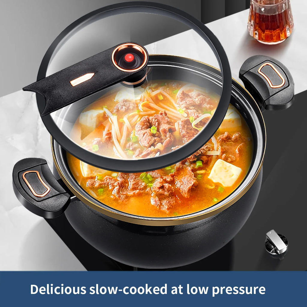 Black micro pressure cooker with glass lid showing stew, gold rim and copper control knob
