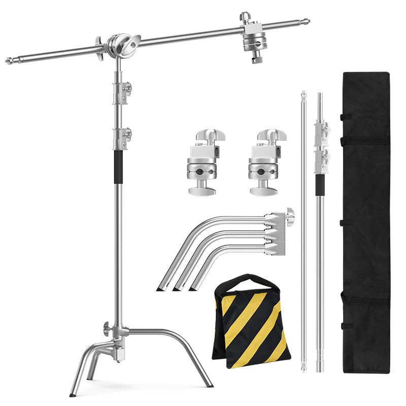Silver C-stand kit with boom arm, two grip heads, sandbag, and carrying case for professional studio lighting support.