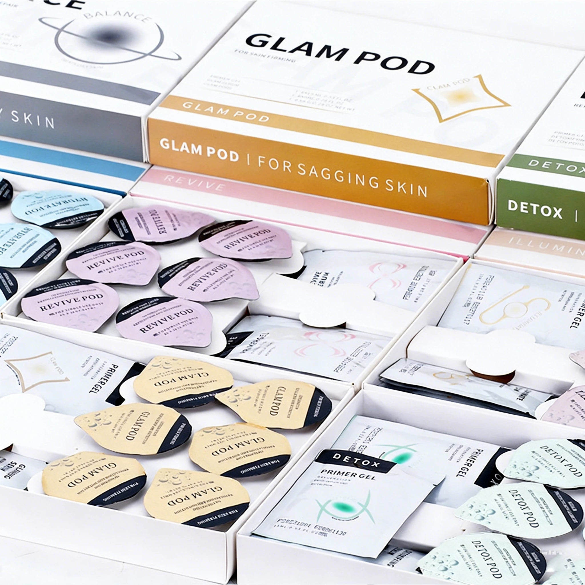 Glam Pod oxygen jet spa facial machine serum gel pods for skin rejuvenation and exfoliation in assorted colored boxes.