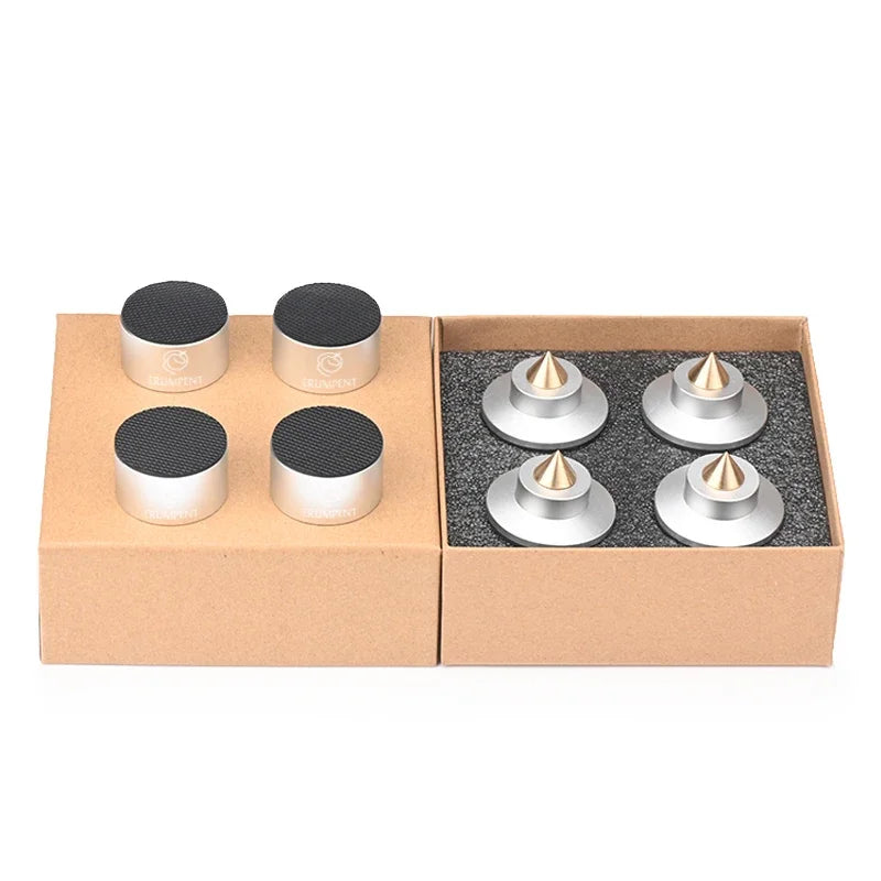 Set of 4 speaker foot pads, black and silver bases with copper spike inserts, in box