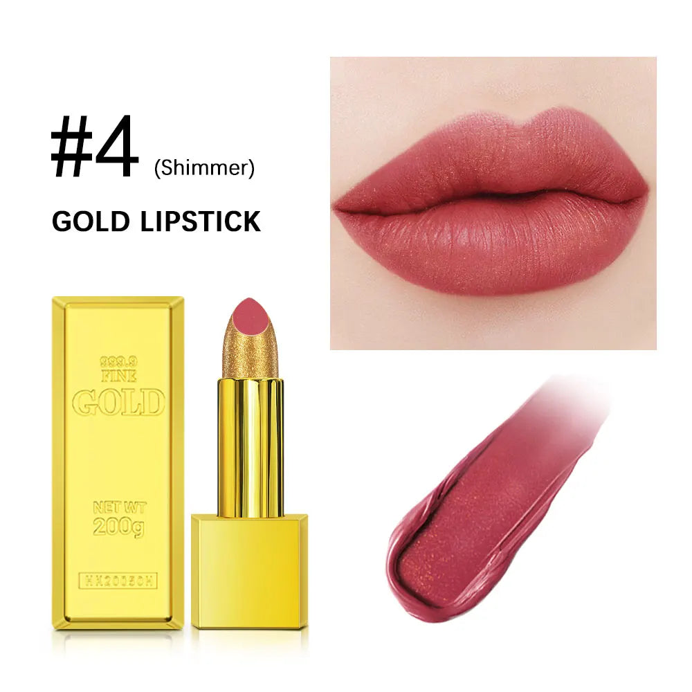 Long-lasting gold glitter lipstick in gold brick tube, pink shimmer shade with creamy swatch and lip application.
