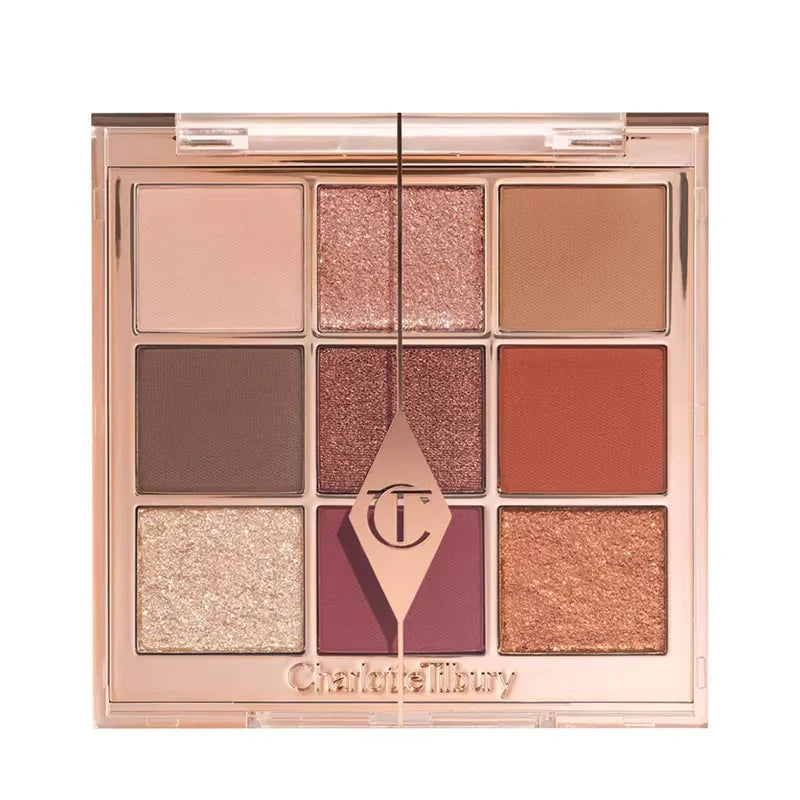 Tidesmit 9 color rose pink eyeshadow palette showing pearly matte and glitter makeup textures in detail view
