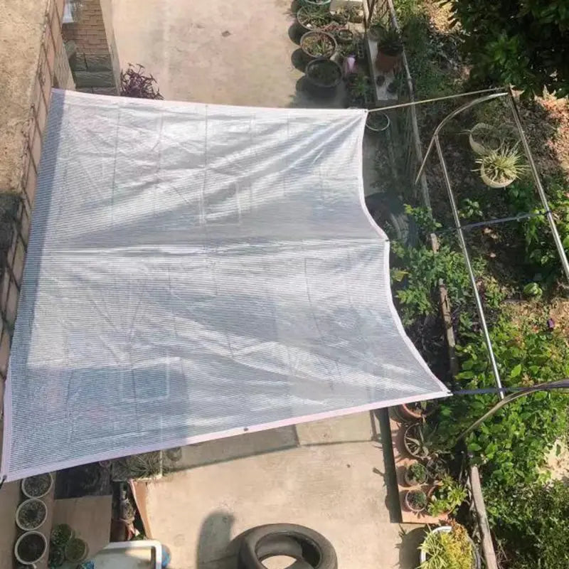 Silver/gray garden sunshade fabric canopy sheet with stitched hem and grommets