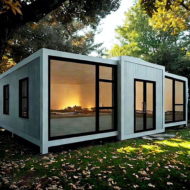 Expandable container house exterior with gray walls and large glass sliding doors