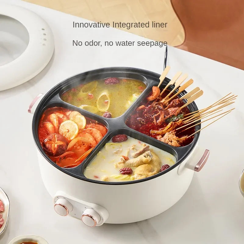 White 4-compartment electric hot pot with four dishes simmering and serving ladles
