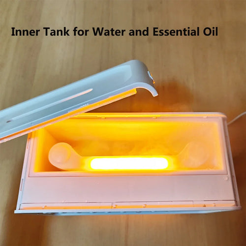 White portable sleep aid with illuminated tank, essential oil diffuser, and sleek button controls for restful sleep.