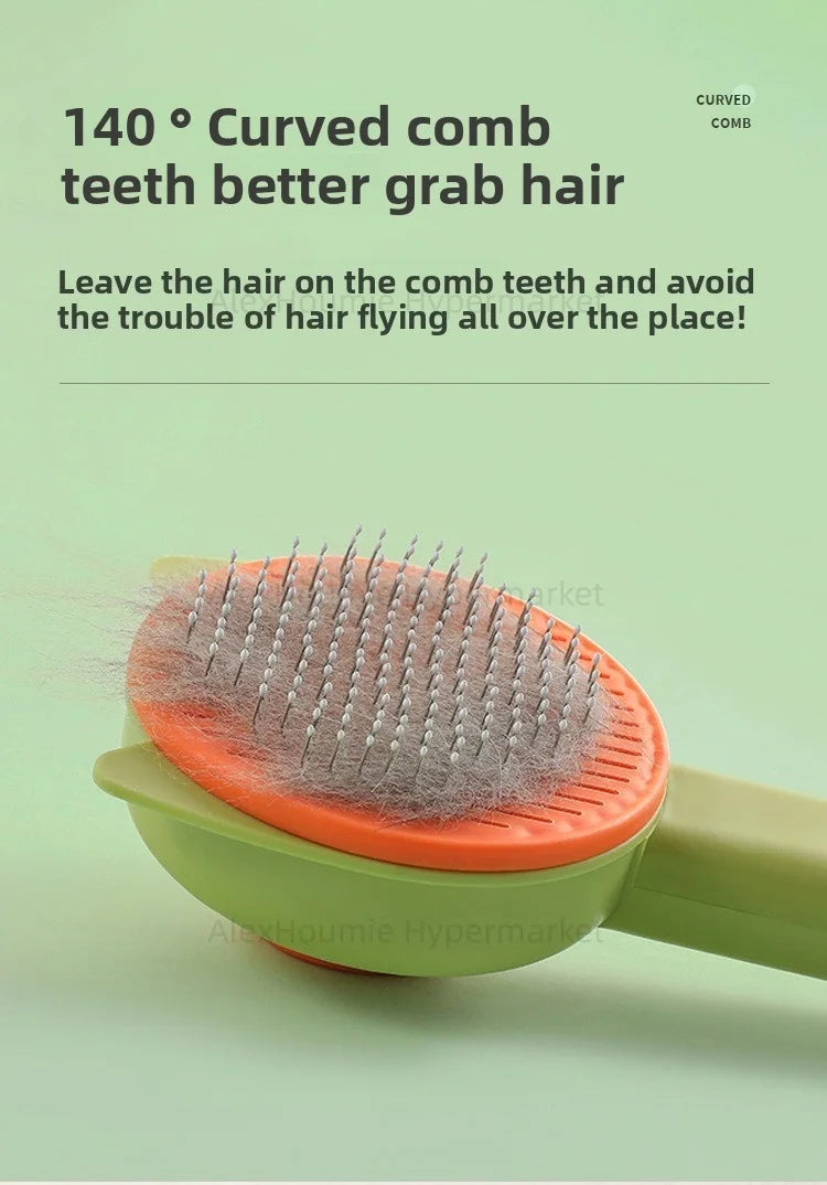 Green and orange cat grooming brush with 140-degree curved teeth for efficient hair removal for kittens and puppies.