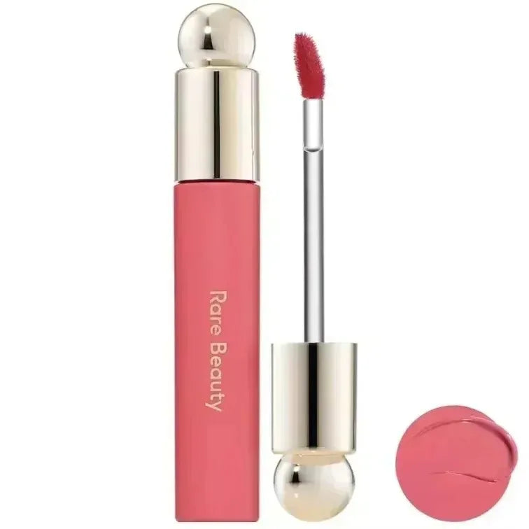 Rare Beauty matte liquid lipstick in a rich, smooth pink shade with applicator wand and color swatch.