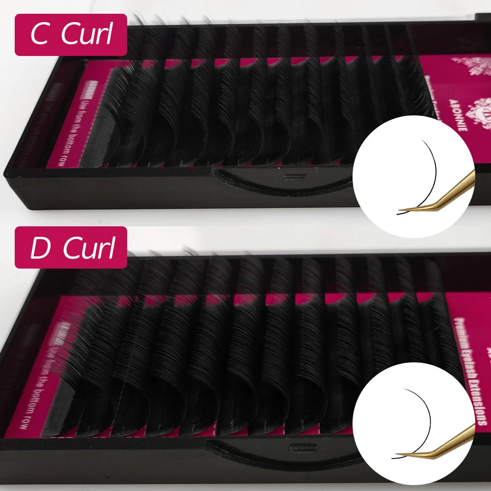 Abonnie black silk eyelash extension trays in C curl and D curl styles with tweezers showing lash curvature.