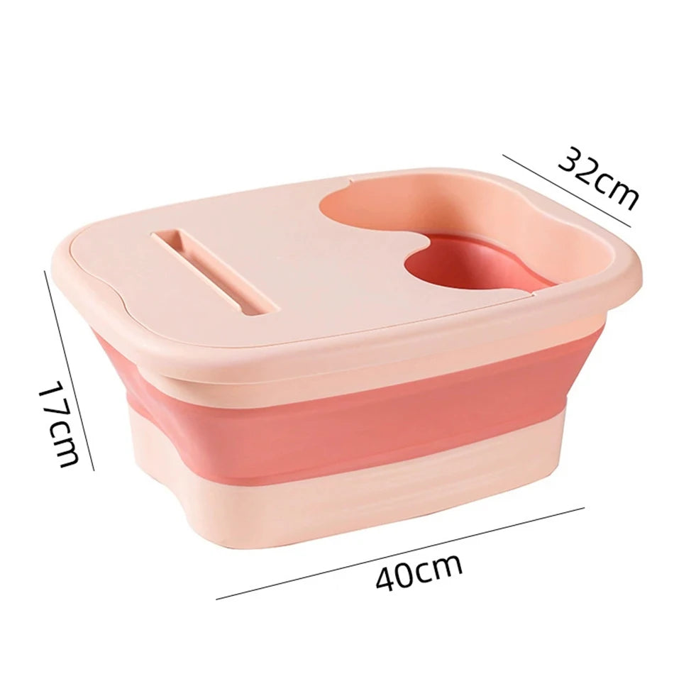 Pink foldable foot bath basin with lid, portable silicone design for travel and home foot soaking. 40x32x17cm.