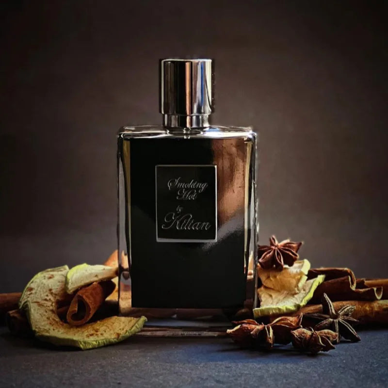 Kilian Smoking Hot EDP: Unisex spicy-woody niche perfume in a sleek, rectangular 50ml bottle with cinnamon and anise.