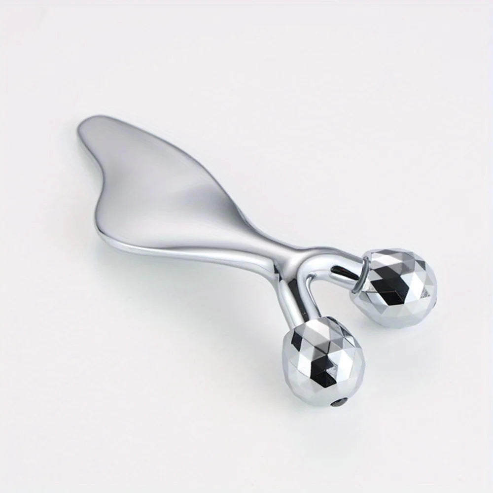 Silver 2-in-1 facial massager featuring a smooth curved Gua Sha handle and two faceted, diamond-cut massage rollers.