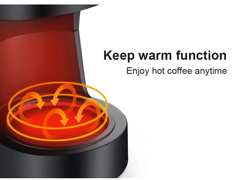 Black coffee maker base with glowing orange keep warm heating plate feature for hot coffee.