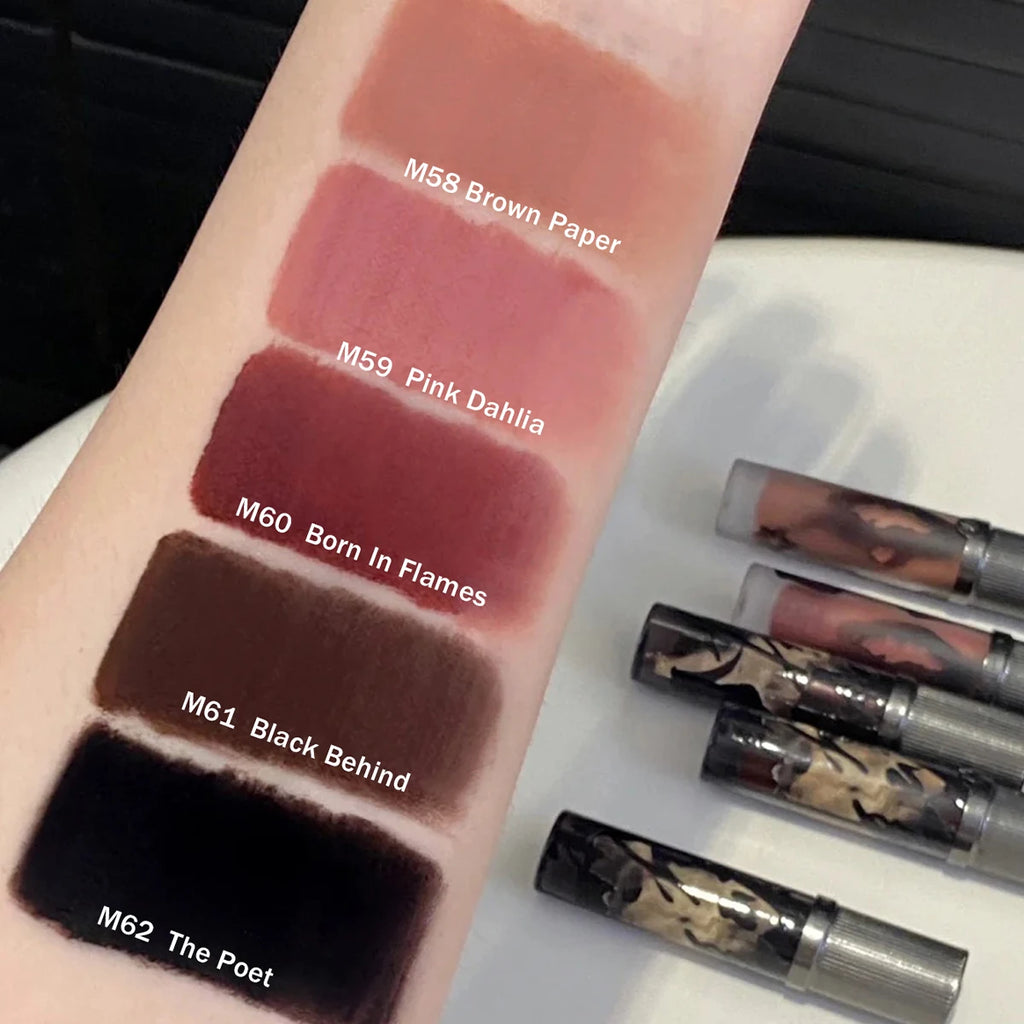 Girlcult Love Whisper velvet matte lip stain swatches on arm in shades M58 to M62 with soft-focus finish.