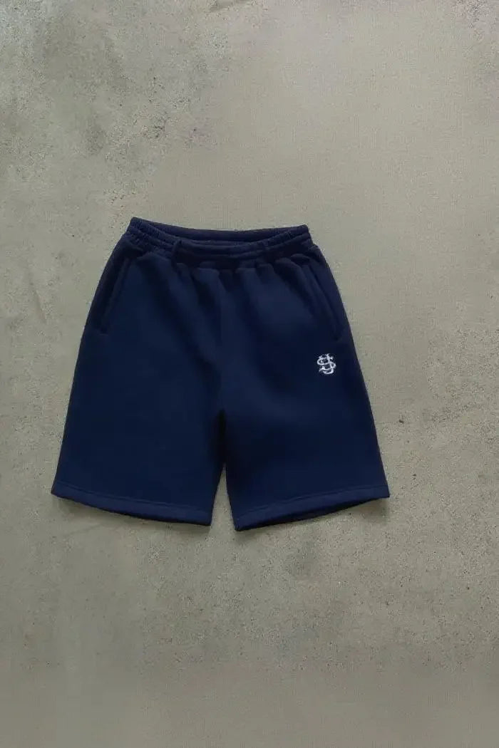 Tidesmit navy blue cotton jogger shorts with an elastic waist and a small white embroidered logo on the leg.