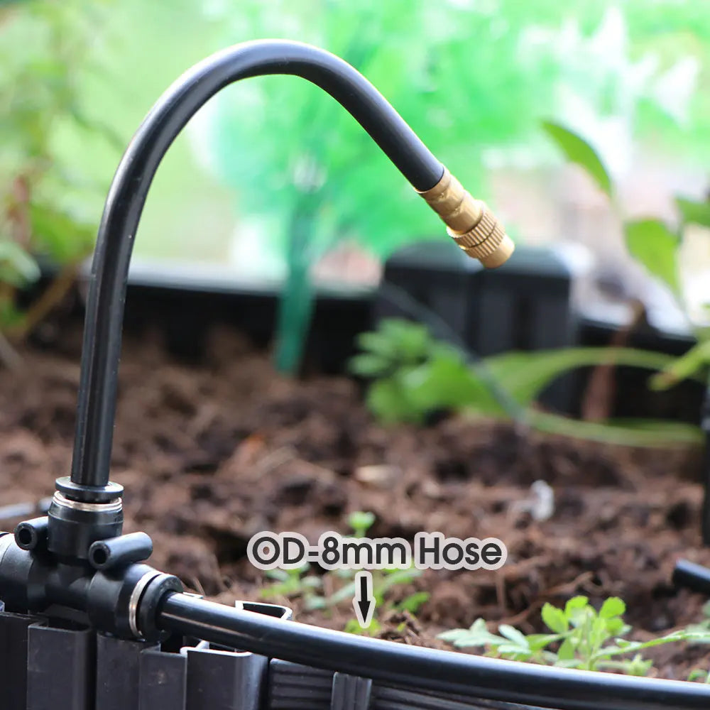Black PE hose assembly with brass connector tip on garden irrigation line