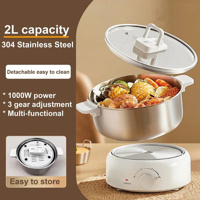 White 2L electric hot pot with 304 stainless inner pot, detachable lid, and front heat dial.