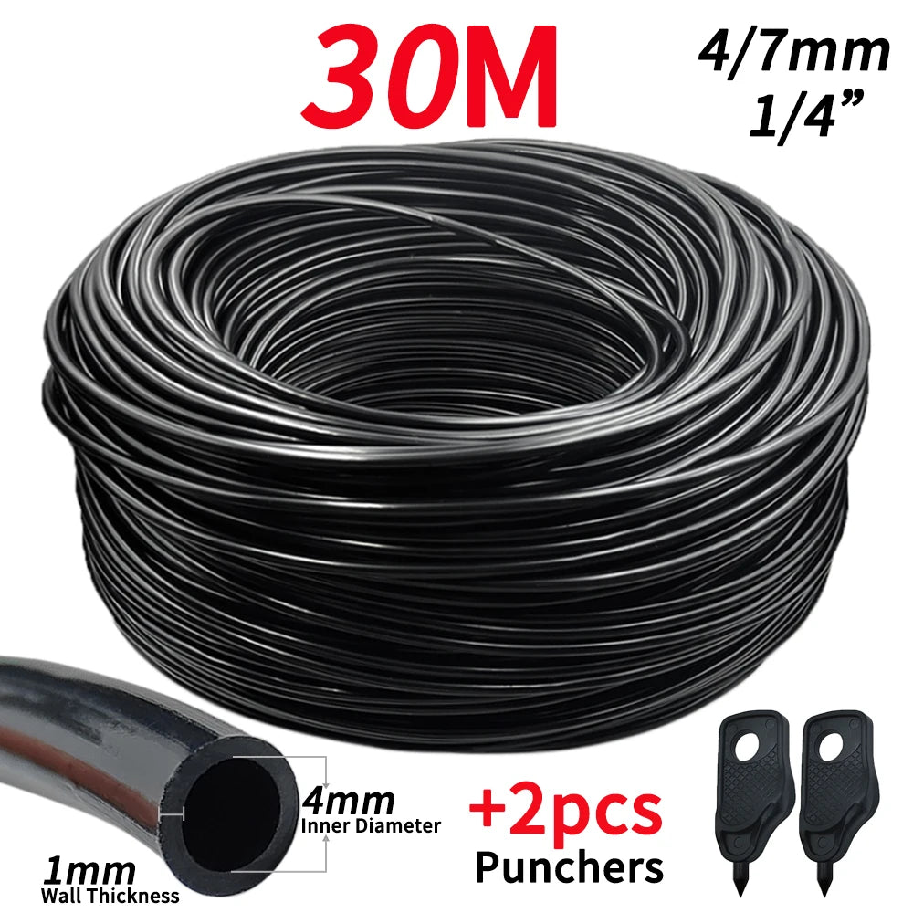 Black drip irrigation hose coil with two hose punchers and quick-connect holders