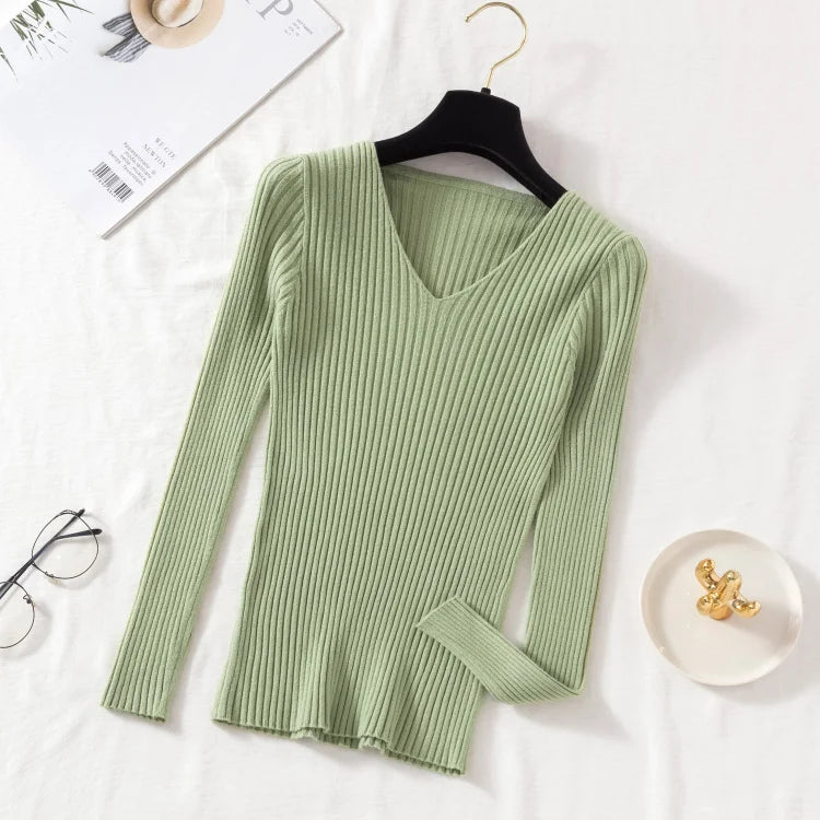 Tidesmit sage green long-sleeve sweater featuring a ribbed knit texture and a classic V-neckline.