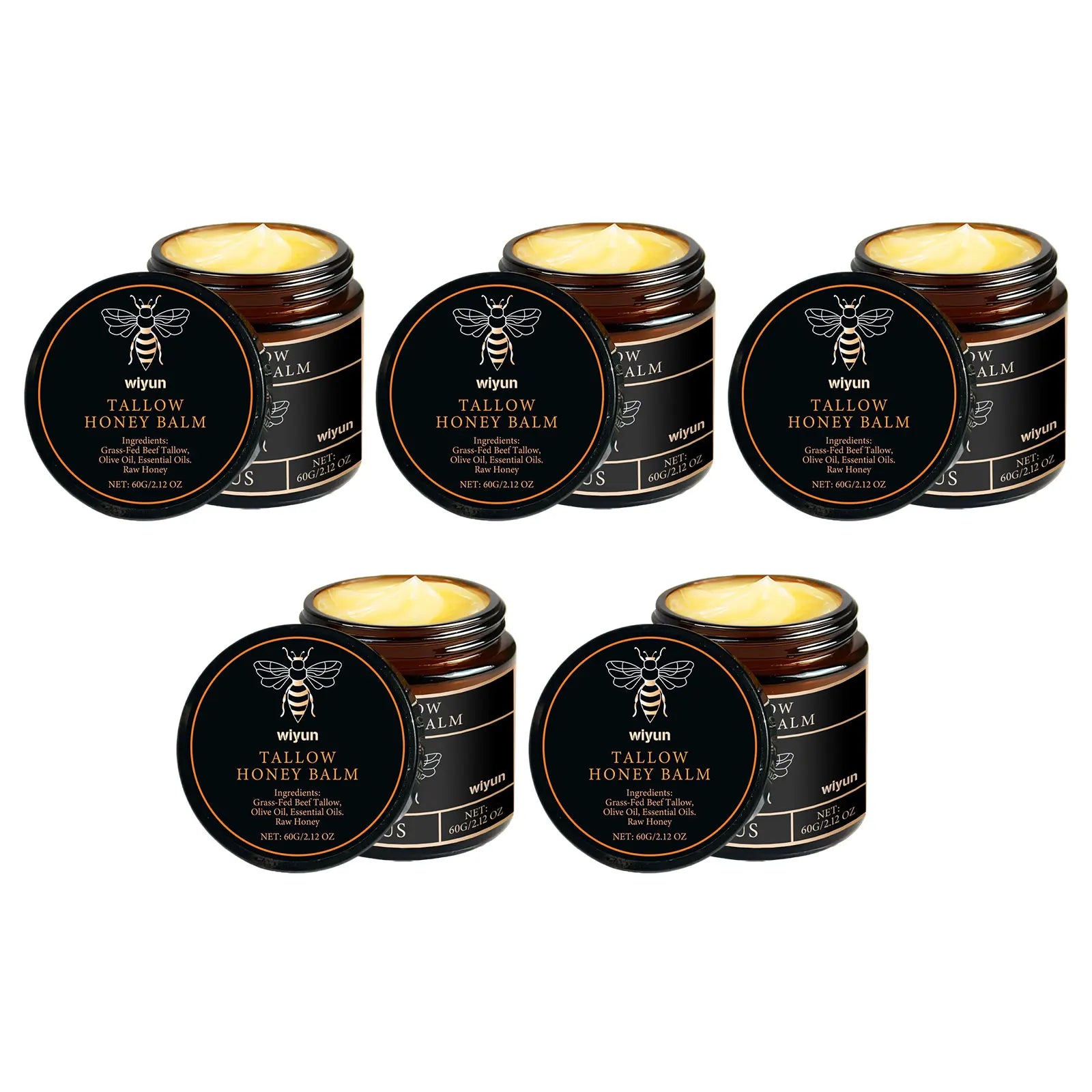 Honey tallow balm tins set with open lids and golden balm on top, black round packaging
