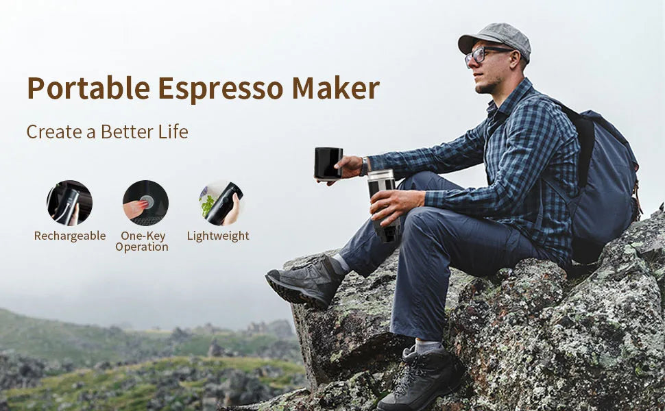 Black, portable, rechargeable travel espresso maker with one-key operation, held by a hiker on a rocky mountain.