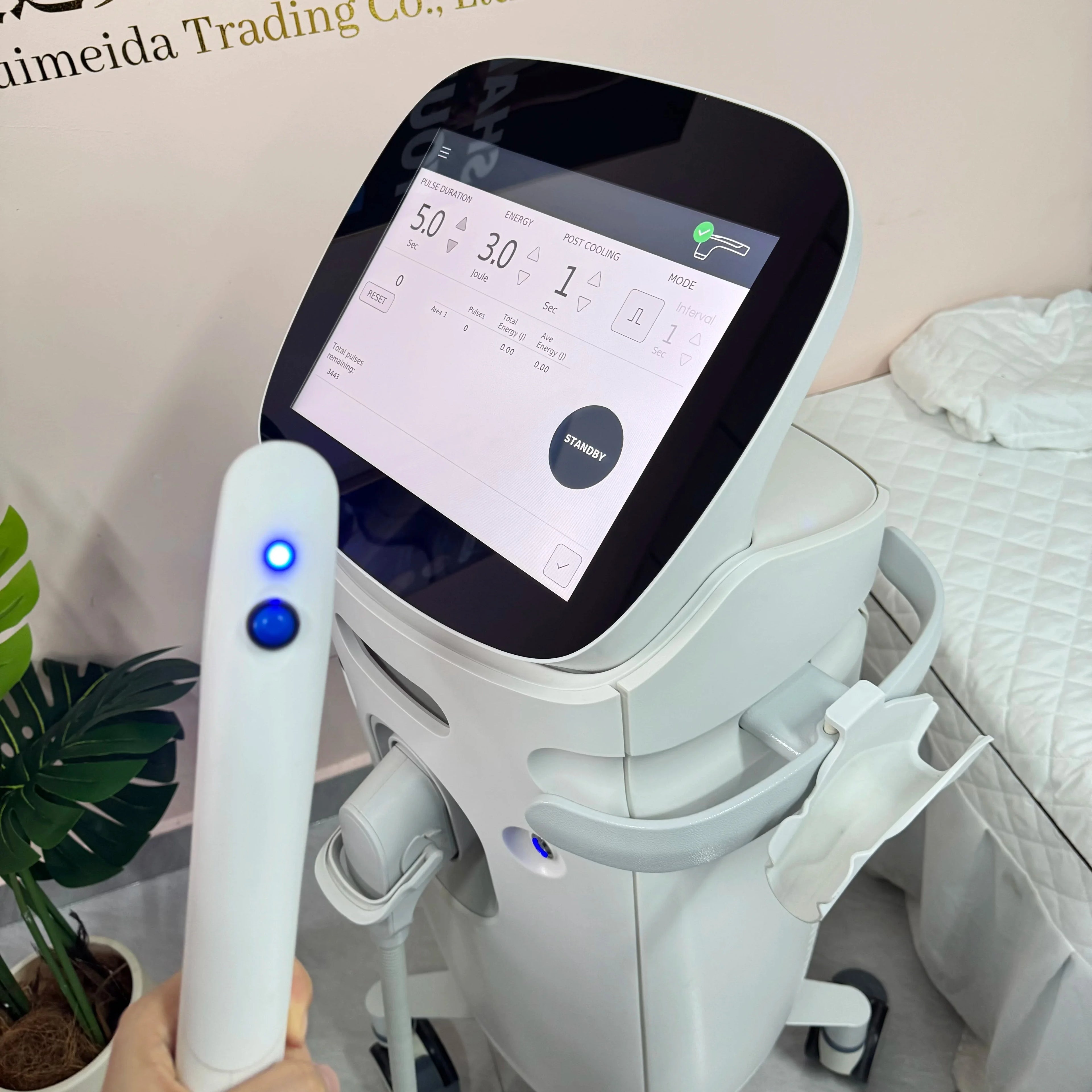 Professional high-intensity facial lifting beauty machine with digital touchscreen and handheld probe for skin care.