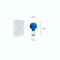 A blue silicone and glass facial cupping tool with dimension labels, shown next to its plain white packaging box.