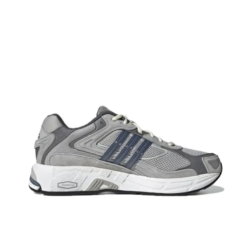Adidas Originals Response CL sneakers in dark gray mesh and suede, featuring navy stripes and a chunky white midsole.