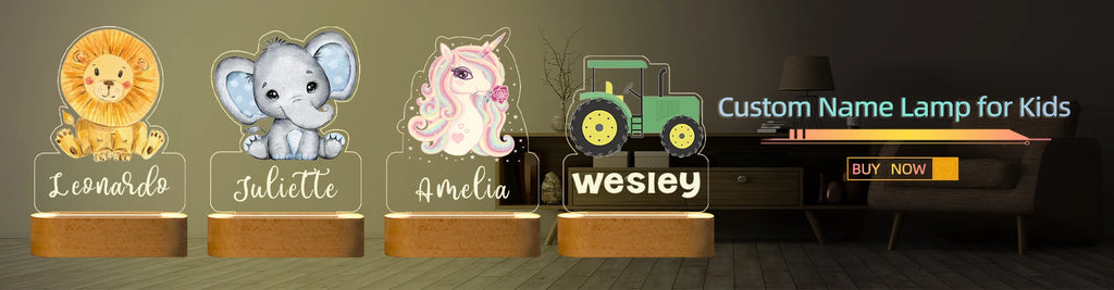 Four custom acrylic name lamps for kids featuring colorful lion, elephant, unicorn, and tractor designs on wood bases.