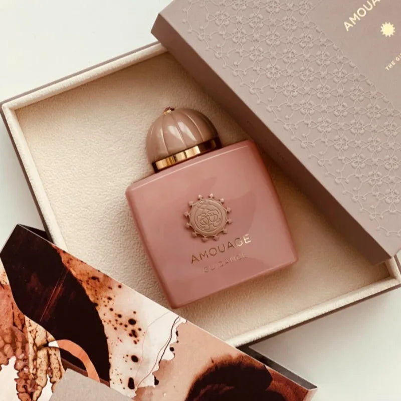 Amouage Guidance 100ml EDP: Unisex woody oriental luxury Arabic perfume in a square pink bottle with domed cap.